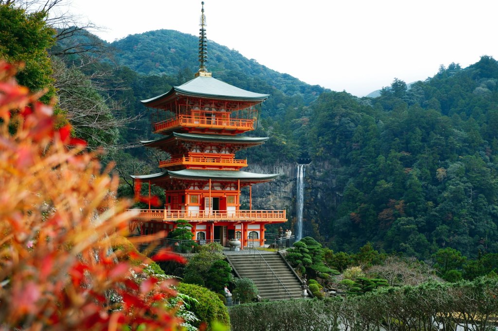The three-story pagoda at Nachisan surrounded by green mountains, Wakayama, Japan