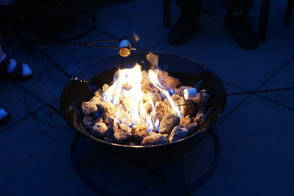 Marshmallows being roasted over a campfire